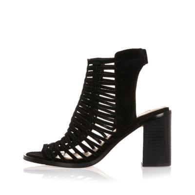 Black suede caged heeled shoe boots